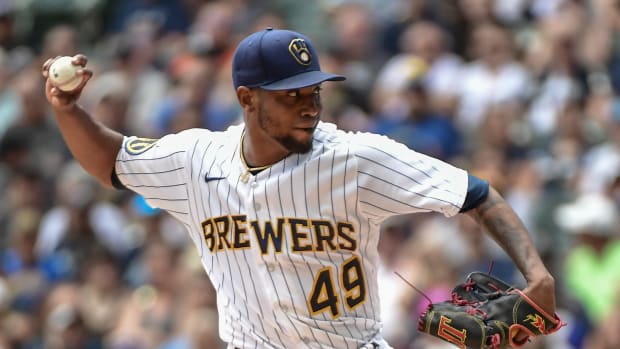 Jul 23, 2023; Milwaukee, Wisconsin, USA; Milwaukee Brewers pitcher Julio Teheran (49) pitches against the Atlanta Braves in the first inning at American Family Field. Mandatory Credit: Benny Sieu-USA TODAY Sports