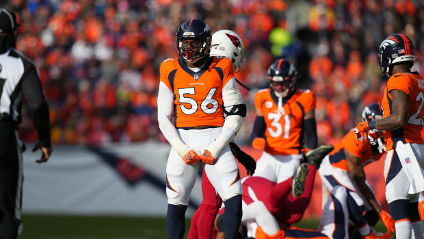 Dec 18, 2022; Denver, Colorado, USA; Denver Broncos linebacker Baron Browning (56) reacts to a play in the first quarter against the Arizona Cardinals at Empower Field at Mile High. Mandatory Credit: Ron Chenoy-USA TODAY Sports