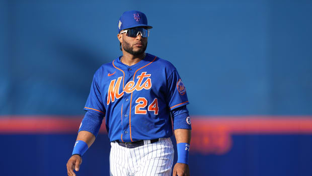 Mar 22, 2022; Port St. Lucie, Florida, USA; New York Mets second baseman Robinson Cano (24) warms up prior to the spring training game against the Houston Astros at Clover Park. Mandatory Credit: Jasen Vinlove-USA TODAY Sports