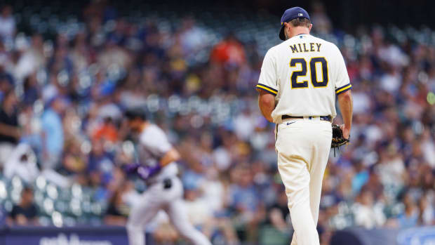 Aug 8, 2023; Milwaukee, Wisconsin, USA; Milwaukee Brewers pitcher Wade Miley (20) looks on after giving up a home run to Colorado Rockies left fielder Nolan Jones (22) during the fourth inning at American Family Field.
