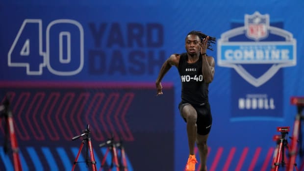 Mar 2, 2024; Indianapolis, IN, USA; Texas wide receiver Xavier Worthy (WO40) ran an official time of 4.21 seconds to set a combine record during the 2024 NFL Combine at Lucas Oil Stadium.
