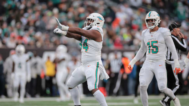 Miami Dolphins defensive tackle Christian Wilkins (94) reacts after a sack during the first half against the New York Jets at MetLife Stadium.