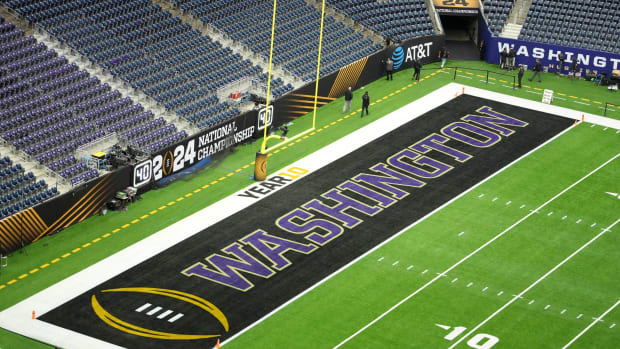 Jan 8, 2024; Houston, TX, USA; The Washington Huskies logo in the end zone before the 2024 College Football Playoff national championship game between the Michigan Wolverines and the Washington Huskies at NRG Stadium. Mandatory Credit: Kirby Lee-USA TODAY Sports