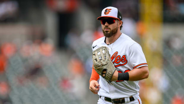 Aug 6, 2023; Baltimore, Maryland, USA; Baltimore Orioles right fielder Ryan McKenna (26) jogs to the dugout after the seventh inning against the New York Mets at Oriole Park at Camden Yards. Mandatory Credit: Reggie Hildred-USA TODAY Sports