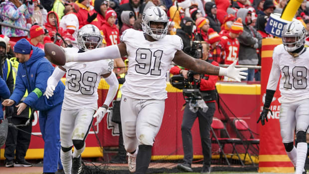 Dec 25, 2023; Kansas City, Missouri, USA; Las Vegas Raiders defensive tackle Bilal Nichols (91) celebrates after recovering a fumble to score against the Kansas City Chiefs during the game at GEHA Field at Arrowhead Stadium.