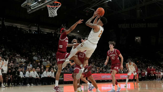 Mar 3, 2024; Boulder, Colorado, USA; Colorado Buffaloes guard KJ Simpson (2) shoots the ball at Stanford Cardinal guard Kanaan Carlyle (3) and Stanford Cardinal in the second half at the CU Events Center. Mandatory Credit: Ron Chenoy-USA TODAY Sports