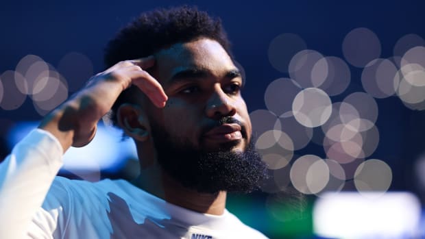 Mar 3, 2024; Minneapolis, Minnesota, USA; Minnesota Timberwolves center Karl-Anthony Towns (32) is introduced prior to the game against the LA Clippers at Target Center.