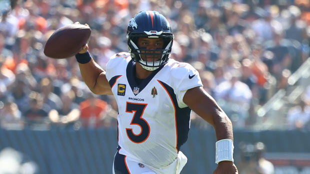 Oct 1, 2023; Chicago, Illinois, USA; Denver Broncos quarterback Russell Wilson (3) drop back to pass against the Chicago Bears during the first half at Soldier Field. Mandatory Credit: Mike Dinovo-USA TODAY Sports