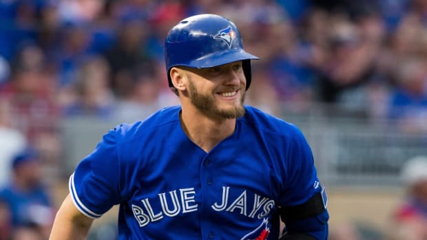 Former Blue Jays third baseman Josh Donaldson reacts to hitting a home run during a game in 2017.