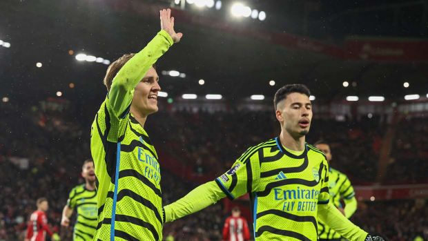 Martin Odegaard (left) and Gabriel Martinelli pictured celebrating a goal during Arsenal's 6-0 win at Sheffield United in March 2024