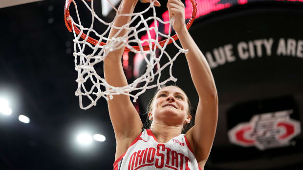 Feb 28, 2024; Columbus, OH, USA; Ohio State Buckeyes guard Jacy Sheldon (4) cuts down the net as the team celebrates winning the Big Ten regular season title after the 67-51 win over the Michigan Wolverines in the NCAA women s basketball game at Value City Arena.