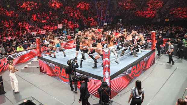 A brawl breaks out inside the ring on Monday Night Raw.