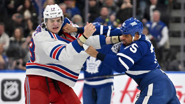 New York Rangers rookie Matt Rempe fights Toronto Maple Leafs veteran Ryan Reaves