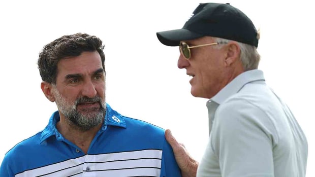 Yasir Al-Rumayyan, president of the Arab Golf Federation and Greg Norman, CEO of LIV Golf Investments are pictured during a practice round prior to the 2023 PIF Saudi International at Royal Greens Golf & Country Club in Saudi Arabia.