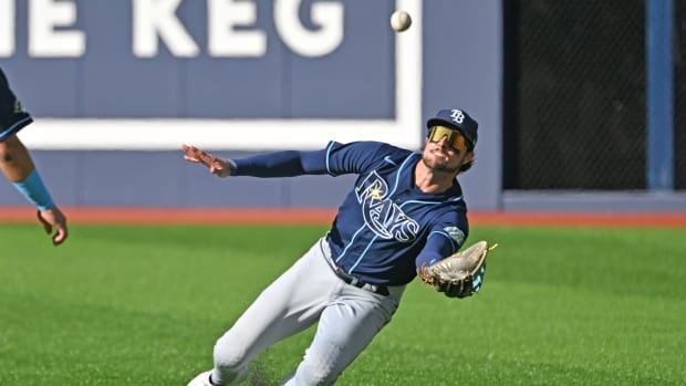 Sep 30, 2023; Toronto, Ontario, CAN; Tampa Bay Rays right fielder Josh Lowe (15) catches a shallow fly ball hit by Toronto Blue Jays third baseman Matt Chapman (not pictured) in the fourth inning at Rogers Centre.