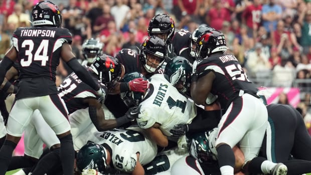 Eagles quarterback Jalen Hurts and center Jason Kelce execute the Tush Push against the Arizona Cardinals.