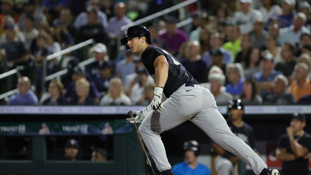 Mar 4, 2024; Jupiter, Florida, USA; New York Yankees outfielder Spencer jones (78) hits a single against the Miami Marlins during the fifth inning at Roger Dean Chevrolet Stadium.