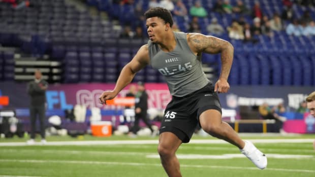Penn State defensive end Chop Robinson competes at the 2024 NFL Scouting Combine.
