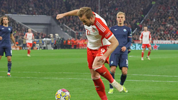 Harry Kane pictured (center) scoring his second goal of the game in Bayern Munich's 3-0 win over Lazio in the UEFA Champions League in March 2024