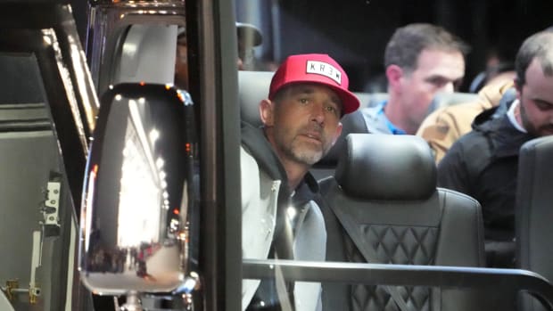 Feb 4, 2024; Las Vegas, NV, USA; San Francisco 49ers coach Kyle Shanahan watches from a team bus during Super Bowl 58 team arrivals at the Harry Reid International Airport. Mandatory Credit: Kirby Lee-USA TODAY Sports  