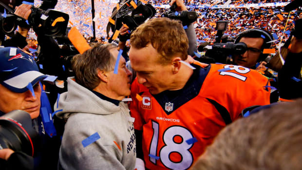 Belichick and Manning after the Broncos’ 20–18 win over the Patriots in the AFC championship on Jan. 24, 2016.