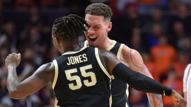 Purdue Boilermaker forward Mason Gillis and teammate Lance Jones (55) celebrate a score during the second half against the Illinois Fighting Illini at State Farm Center.