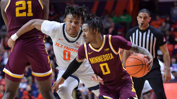 Minnesota guard Elijah Hawkins (0) drives the ball past Illinois guard Terrence Shannon Jr. (0) during the second half at State Farm Center in Champaign, Ill., on Feb. 28, 2024.