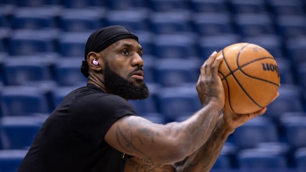 Caption: Dec 31, 2023; New Orleans, Louisiana, USA; Los Angeles Lakers forward LeBron James during warmups before the game against the New Orleans Pelicans at Smoothie King Center. Mandatory Credit: Stephen Lew-USA TODAY Sports