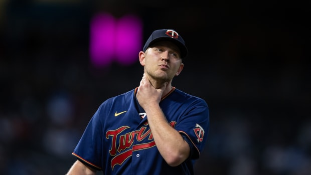May 26, 2022; Minneapolis, Minnesota, USA; Minnesota Twins relief pitcher Tyler Duffey (21) reacts during the eighth inning against the Kansas City Royals at Target Field.