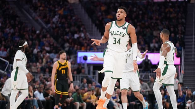 Milwaukee Bucks forward Giannis Antetokounmpo (34) reacts after the Bucks made a basket against the Golden State Warriors 