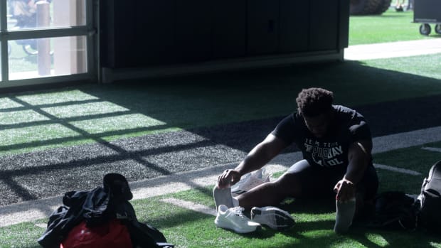 Texas Tech's defensive lineman Gabe Oladipo stretches before Pro Day, Wednesday, March 29, 2023, at Sports Performance Center.