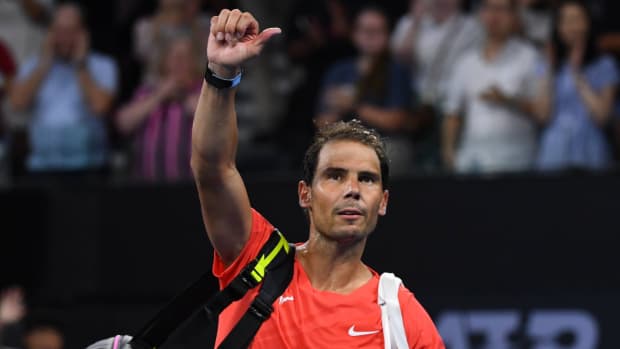 Rafael Nadal gives a thumbs up to the crowd at the 2024 Brisbane Invitational.
