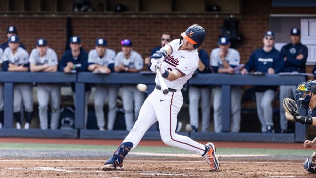 Ethan Anderson swings at a pitch during the Virginia baseball game against Penn State at Disharoon Park.