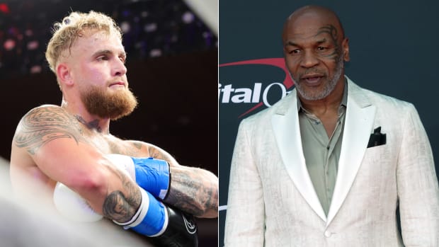 A split image of boxers Jake Paul and Mike Tyson.