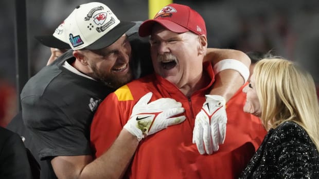 Chiefs tight end Travis Kelce and head coach Andy Reid celebrate after winning a Super Bowl together.