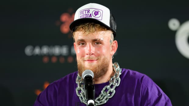 Boxer Jake Paul speaks to media after knocking out Andre August in Dec. 2023.