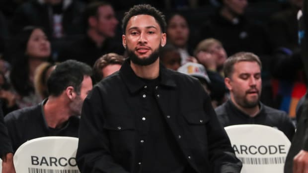 Feb 29, 2024; Brooklyn, New York, USA; Brooklyn Nets guard Ben Simmons (not in uniform) sits on the bench in the first quarter against the Atlanta Hawks at Barclays Center.