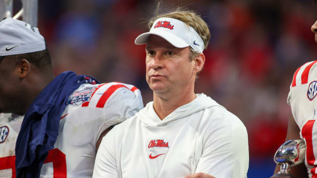 Lane Kiffin looks on during Ole Miss’s Peach Bowl win.