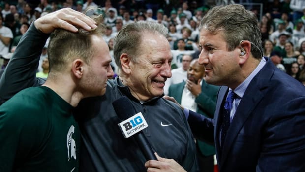 Michigan State head coach Tom Izzo and guard Steven Izzo (13) are interviewed by the Big Ten Network after 53-49 win over Northwestern at Breslin Center in East Lansing on Wednesday, March 6, 2024.