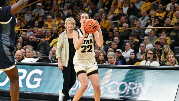 Iowa's Caitlin Clark takes a shot against Penn State in a Big Ten women's basketball game in Iowa City.