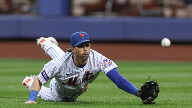 Sep 27, 2023; New York City, New York, USA; New York Mets second baseman Jeff McNeil (1) dives for a fly ball during the eighth inning against the Miami Marlins at Citi Field.