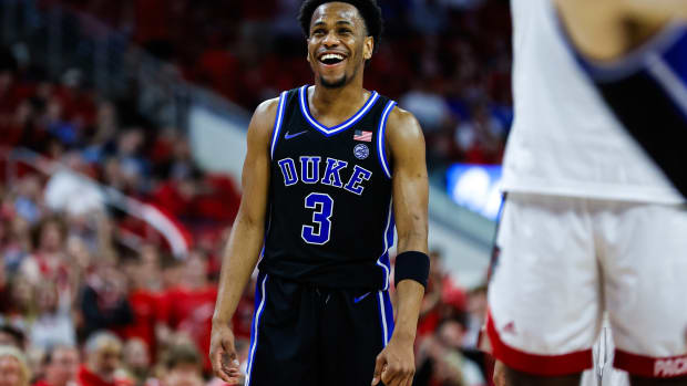 Mar 4, 2024; Raleigh, North Carolina, USA; Duke Blue Devils guard Jeremy Roach (3) smiles during the first half against North Carolina State Wolfpack at PNC Arena. 