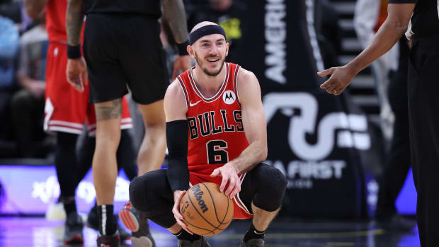 Chicago Bulls guard Alex Caruso (6) reacts to a play against the Utah Jazz during the fourth quarter at Delta Center.