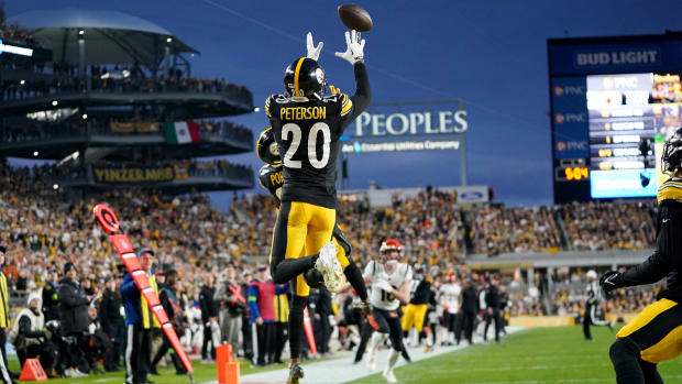 Dec 23, 2023; Pittsburgh, PA, USA; Pittsburgh Steelers cornerback Patrick Peterson (20) intercepts a pass in the first quarter during a Week 16 NFL football game between the Cincinnati Bengals and the Pittsburgh Steelers at Acrisure Stadium.