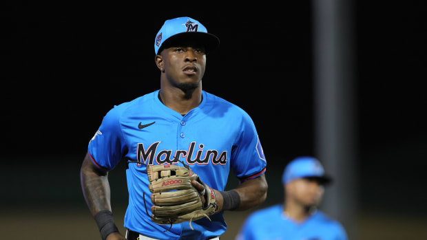 Mar 4, 2024; Jupiter, Florida, USA; Miami Marlins shortstop Tim Anderson (7) looks on against the New York Yankees during the second inning at Roger Dean Chevrolet Stadium.