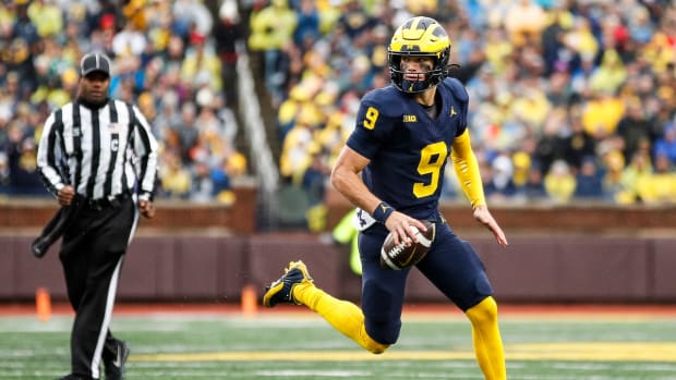 Michigan quarterback J.J. McCarthy runs for a first down against Indiana during the first half of U-M's 52-7 win over Indiana on Saturday, Oct. 14, 2023, in Ann Arbor.