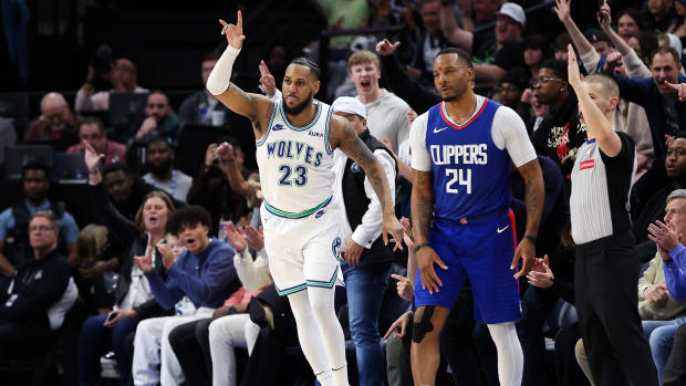 Mar 3, 2024; Minneapolis, Minnesota, USA; Minnesota Timberwolves guard Monte Morris (23) celebrates his three-point basket against the LA Clippers during the second half at Target Center.