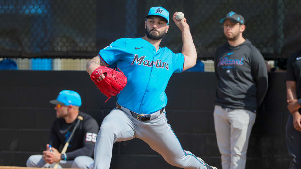 Feb 17, 2024; Jupiter, FL, USA; Miami Marlins relief pitcher Tanner Scott (66) delivers a pitch during a spring training workout at the Marlins Player Development & Scouting Complex.