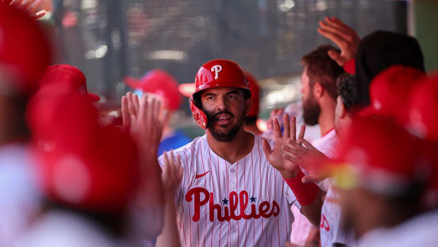 Feb 25, 2024; Clearwater, Florida, USA; Philadelphia Phillies first baseman Darick Hall (24) celebrates after scoring a run against the New York Yankees in the second inning at BayCare Ballpark. Mandatory Credit: Nathan Ray Seebeck-USA TODAY Sports