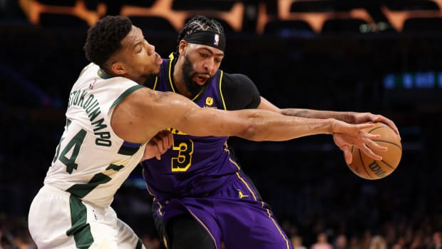Milwaukee Bucks forward Giannis Antetokounmpo (34) defends Los Angeles Lakers forward Anthony Davis (3) during the third quarter at Crypto.com Arena.